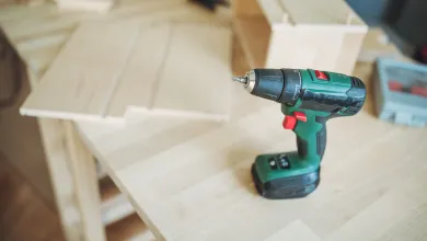 Drill on wooden table